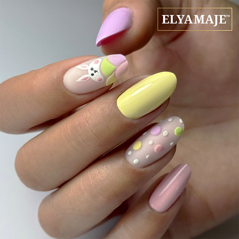 Nail art inspiration Pâques aux tons doux et design délicat